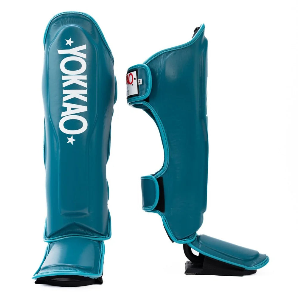 מגיני עצם לאיגרוף תאילנדי YOKKAO Legacy עם בטנה מונעת החלקה--תורכיז