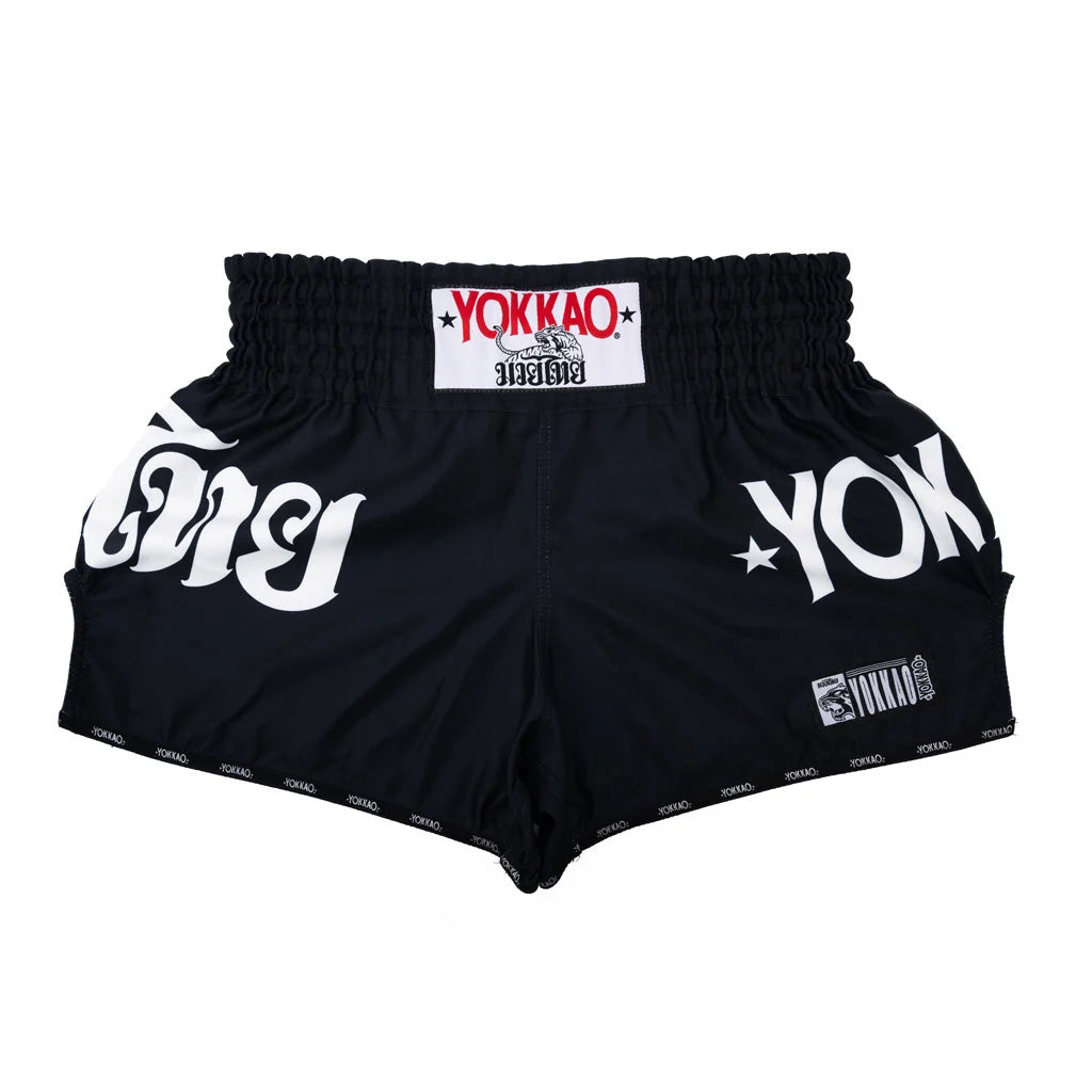 מכנסי איגרוף תאילנדי יוקאו דגם YOKKAO Legacy מבד סאטן פרימיום--שחור