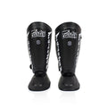 Fairtex SP7 shin guard pair in action pose highlighting additional ankle protection--שחור